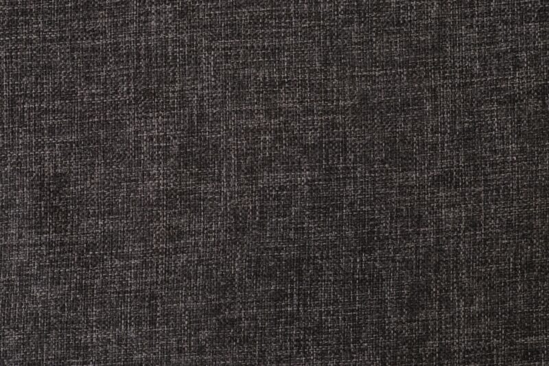 Close-up of woven technical fabric texture, similar to D50T and Dyneema laminates used in ultralight gear