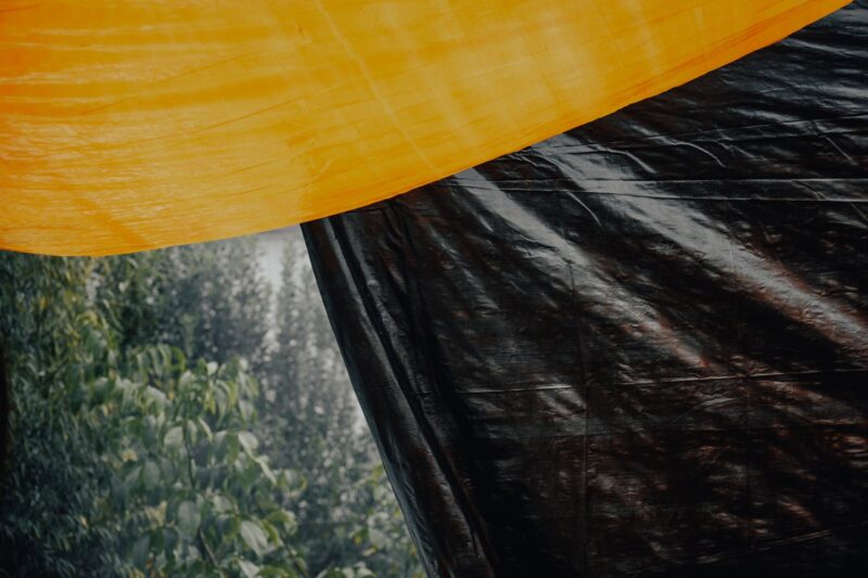 Ultralight Tarp Pitching Guide: A-Frame vs. Pyramid Setups