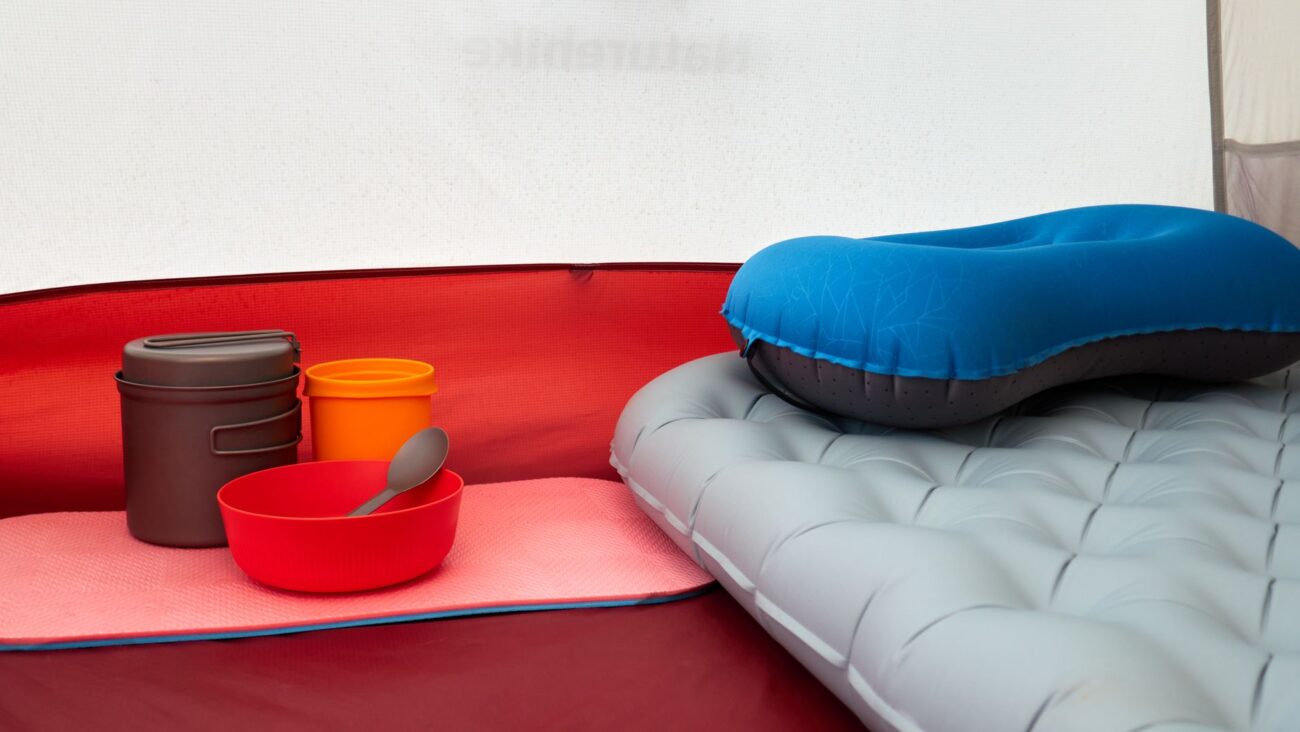 cozy camping tent setup with cookware