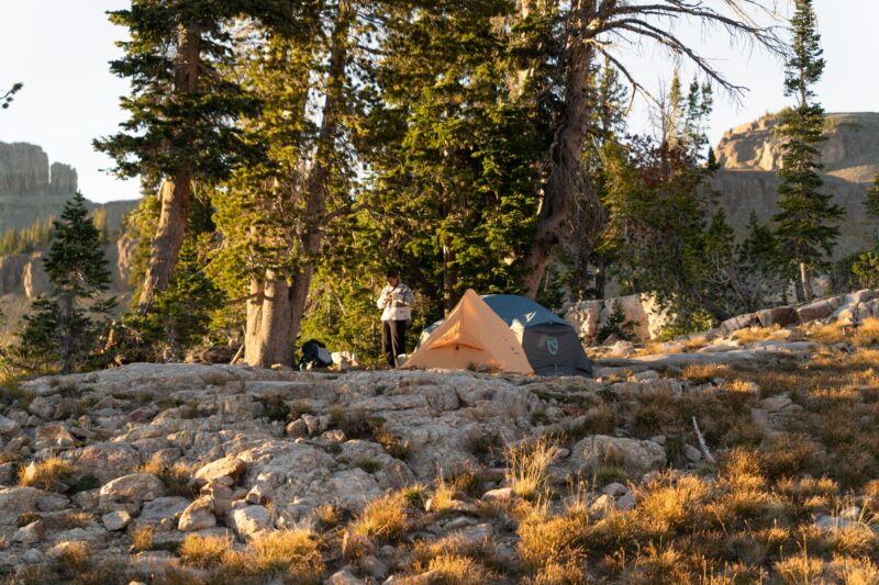 Ultralight backpacking tent pitched in a mountain wilderness setting
